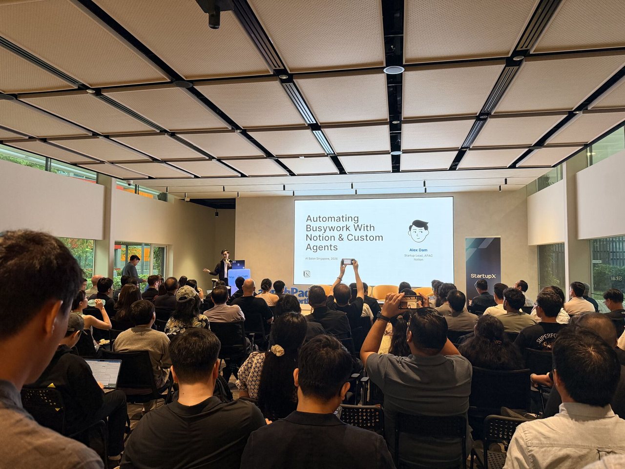Custom Agents talk, Singapore. On stage with the room.